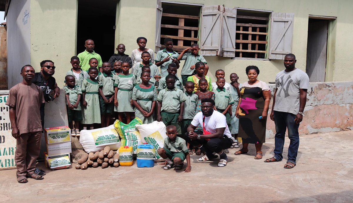 Bishop Ojo and kids from Ibadan school for the deaf