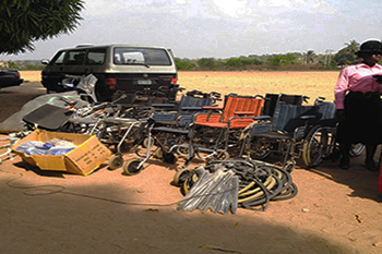 Image of wheelchairs being donated in Ibadan, Nigeria